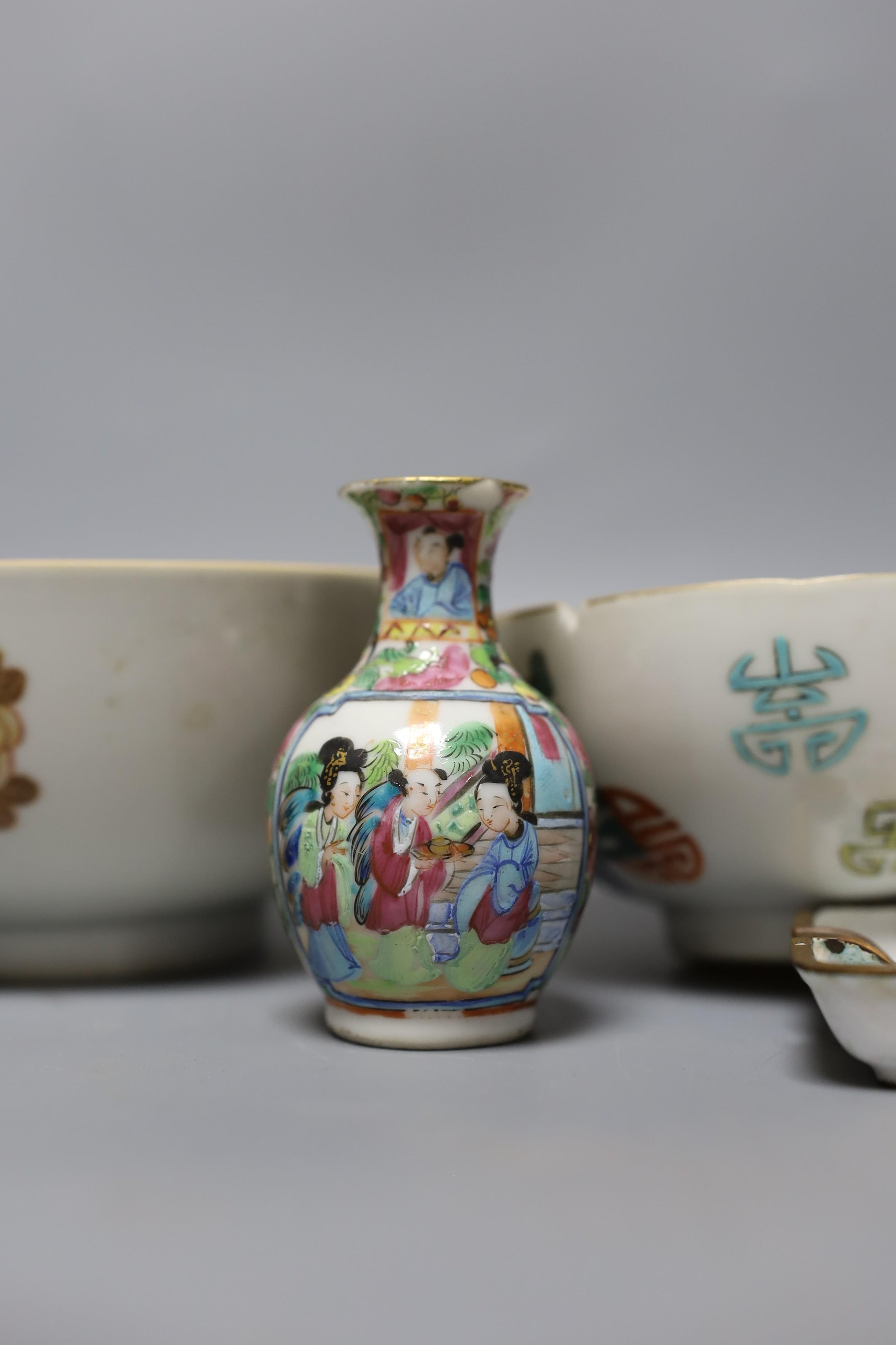 Two Chinese enamelled porcelain bowls and two vases and two Canton enamel dishes, 18th century and later, tallest 16 cm